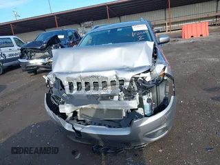 2020 Jeep Cherokee Latitude Plus with VIN 1C4PJMLB4LD652178, listed as a IAAI auction lot 41865642 with 77,096 mi miles and . Bid and sale history available at DreamBid. Image 6.