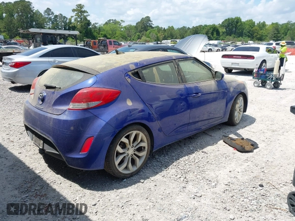 2012 Hyundai Veloster w/Gray Int with VIN KMHTC6AD7CU050444, listed as a IAAI auction lot 42170272 with 121,478 mi miles and . Bid and sale history available at DreamBid. Image 4.