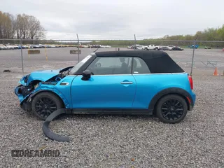 2016 MINI Convertible with VIN WMWWG5C52G3A81084, listed as a IAAI auction lot 41954333 with 78,558 mi miles and . Bid and sale history available at DreamBid. Image 14.