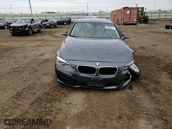 2018 BMW 3 Series 320i xDrive z VIN WBA8A3C57JA491717, wystawiony jako Copart lot #49509515 z przebiegiem 57 141 mil mil oraz Szkoda całkowita • Salvage title. Historia ofert i sprzedaży dostępna na DreamBid. Obrazek 11.