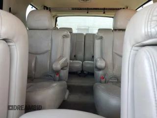 2004 Cadillac Escalade z VIN 1GYEK63N24R251463, wystawiony jako Copart lot #59404565 z przebiegiem 215 203 mil mil oraz Czysty tytuł • Clean title. Historia ofert i sprzedaży dostępna na DreamBid. Obrazek 10.