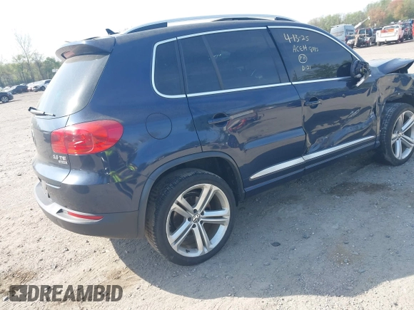 2014 Volkswagen Tiguan S z VIN WVGBV3AX7EW545538, wystawiony jako IAAI lot #42083281 z przebiegiem 129 227 mil mil oraz . Historia ofert i sprzedaży dostępna na DreamBid. Obrazek 4.