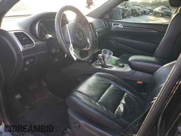 2018 Jeep Grand Cherokee High Altitude with VIN 1C4RJFCG3JC488022, listed as a Copart auction lot 87700385 with 94,390 mi miles and Salvage title. Bid and sale history available at DreamBid. Image 7.