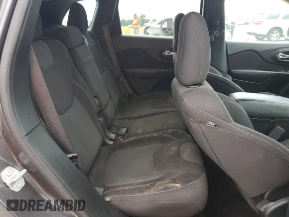 2017 Jeep Cherokee Latitude z VIN 1C4PJLCB5HW554279, wystawiony jako Copart lot #56972145 z przebiegiem 117 164 mil mil oraz Szkoda całkowita • Salvage title. Historia ofert i sprzedaży dostępna na DreamBid. Obrazek 11.
