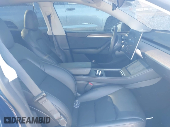 2024 Tesla Model Y Long Range with VIN 7SAYGDEE5RA252075, listed as a IAAI auction lot 41380481 with 13,088 mi miles. Bid and sale history available at carsss.com. Image 5.