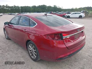 2017 Ford Fusion SE z VIN 3FA6P0HD2HR401046, wystawiony jako IAAI lot #41965539 z przebiegiem 92 664 mil mil oraz . Historia ofert i sprzedaży dostępna na DreamBid. Obrazek 3.