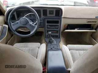 1987 Ford Thunderbird with VIN 1FABP64W7HH137025, listed as a Copart auction lot 80162264 with 137,140 mi miles and Salvage Title. Bid and sale history available at DreamBid. Image 8.