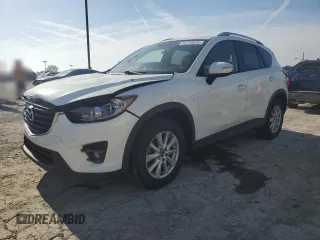2016 Mazda CX-5 Touring z VIN JM3KE2CYXG0683673, wystawiony jako Copart lot #56724025 z przebiegiem 107 293 mil mil oraz Szkoda całkowita • Salvage title. Historia ofert i sprzedaży dostępna na DreamBid. Obrazek 1.