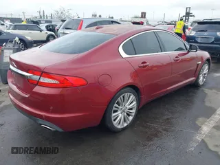 2012 Jaguar XF Portfolio with VIN SAJWA0HB5CLS21062, listed as a IAAI auction lot 41733179 with 125,614 mi miles. Bid and sale history available at carsss.com. Image 4.