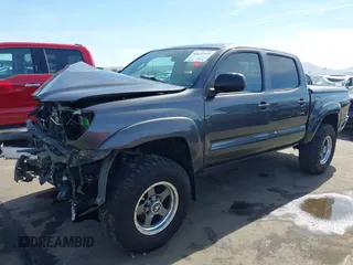 2014 Toyota Tacoma with VIN 3TMLU4EN0EM145573, listed as a IAAI auction lot 41621189 with 178,281 mi miles. Bid and sale history available at carsss.com. Image 18.