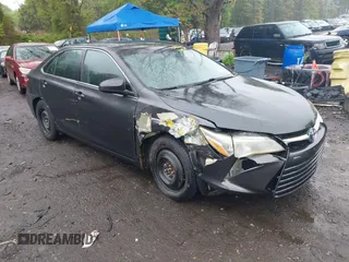 2015 Toyota Camry LE with VIN 4T1BD1FK8FU159177, listed as a IAAI auction lot 42149932 with 387,046 mi miles and . Bid and sale history available at DreamBid. Image 1.