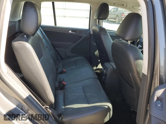 2014 Volkswagen Tiguan SE with VIN WVGAV3AX8EW619044, listed as a Copart auction lot 46990185 with 171,972 mi miles and Salvage title. Bid and sale history available at DreamBid. Image 11.