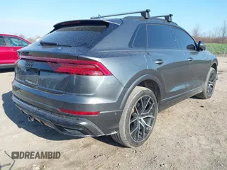 2021 Audi Q8 Premium Plus z VIN WA1EVAF14MD014781, wystawiony jako IAAI lot #42080085 z przebiegiem 53 171 mil mil oraz . Historia ofert i sprzedaży dostępna na DreamBid. Obrazek 4.