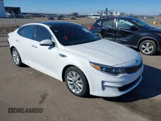 2016 Kia Optima EX with VIN 5XXGU4L32GG032974, listed as a IAAI auction lot 41881338 with 118,590 mi miles. Bid and sale history available at carsss.com. Image 1.