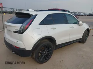 2019 Cadillac XT4 FWD Sport with VIN 1GYFZER45KF224300, listed as a IAAI auction lot 40949318 with 57,705 mi miles. Bid and sale history available at carsss.com. Image 4.