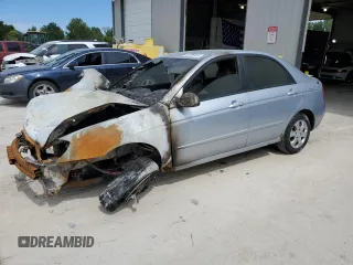 2006 Kia Spectra EX with VIN KNAFE121665348840, listed as a Copart auction lot 69798184 with 0 mi miles and Salvage Title. Bid and sale history available at carsss.com. Image 1.