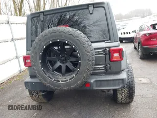 2020 Jeep Wrangler Unlimited Sport z VIN 1C4HJXDN3LW164701, wystawiony jako IAAI lot #41200437 z przebiegiem 102 272 mil mil oraz . Historia ofert i sprzedaży dostępna na DreamBid. Obrazek 16.