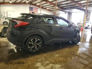 2018 Toyota C-HR XLE z VIN NMTKHMBX0JR041387, wystawiony jako Copart lot #57050385 z przebiegiem Nie podano mil oraz Szkody całkowita. Historia ofert i sprzedaży dostępna na DreamBid. Obrazek 3.