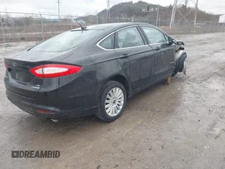 2015 Ford Fusion SE Hybrid with VIN 3FA6P0LU1FR289246, listed as a IAAI auction lot 41733229 with 125,195 mi miles. Bid and sale history available at carsss.com. Image 4.