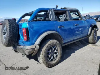 2021 Ford Bronco z VIN 1FMEE5DH6MLA74091, wystawiony jako Copart lot #46137495 z przebiegiem 54 780 mil mil oraz Szkoda całkowita • Salvage title. Historia ofert i sprzedaży dostępna na DreamBid. Obrazek 3.