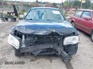 2016 Chrysler 300 with VIN 2C3CCAEG9GH282438, listed as a IAAI auction lot 42025184 with 203,159 mi miles. Bid and sale history available at carsss.com. Image 12.