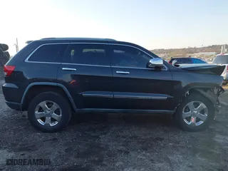 2011 Jeep Grand Cherokee Limited with VIN 1J4RR5GG6BC580766, listed as a IAAI auction lot 41618505 with 230,000 mi miles. Bid and sale history available at carsss.com. Image 12.