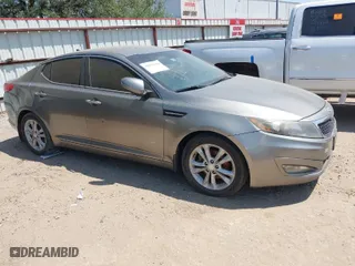 2012 Kia Optima EX with VIN 5XXGN4A76CG088476, listed as a IAAI auction lot 42074430 with 210,965 mi miles. Bid and sale history available at carsss.com. Image 1.