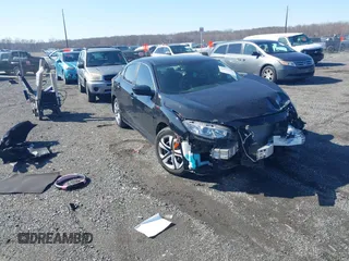 2018 Honda Civic LX with VIN 19XFC2F58JE042456, listed as a IAAI auction lot 41823195 with 45,291 mi miles and . Bid and sale history available at DreamBid. Image 1.