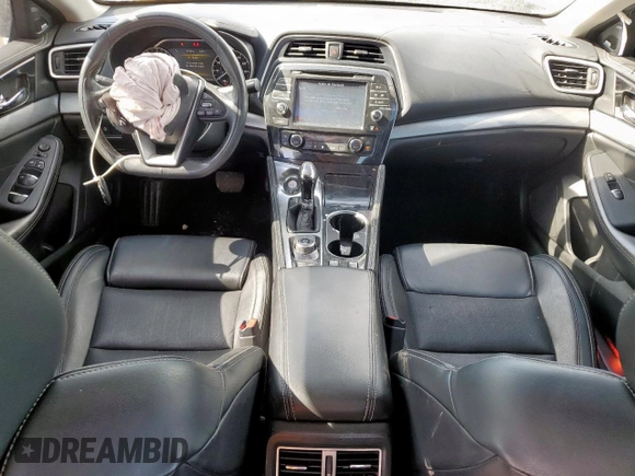 2017 Nissan Maxima SL with VIN 1N4AA6AP0HC409194, listed as a Copart auction lot 57604005 with 98,000 mi miles and Salvage title. Bid and sale history available at DreamBid. Image 8.