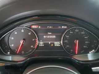 2012 Audi A8 with VIN WAURVAFD0CN028037, listed as a Copart auction lot 61004815 with 97,424 mi miles and Salvage title. Bid and sale history available at DreamBid. Image 9.
