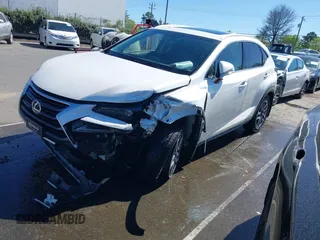 2016 Lexus NX 200t with VIN JTJBARBZ4G2090433, listed as a IAAI auction lot 41811242 with 148,149 mi miles. Bid and sale history available at carsss.com. Image 2.