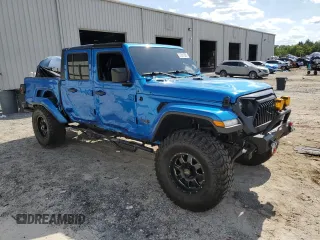 2020 Jeep Gladiator Overland z VIN 1C6HJTFG4LL162262, wystawiony jako Copart lot #57261325 z przebiegiem 74 856 mil mil oraz Szkoda całkowita • Salvage title. Historia ofert i sprzedaży dostępna na DreamBid. Obrazek 4.