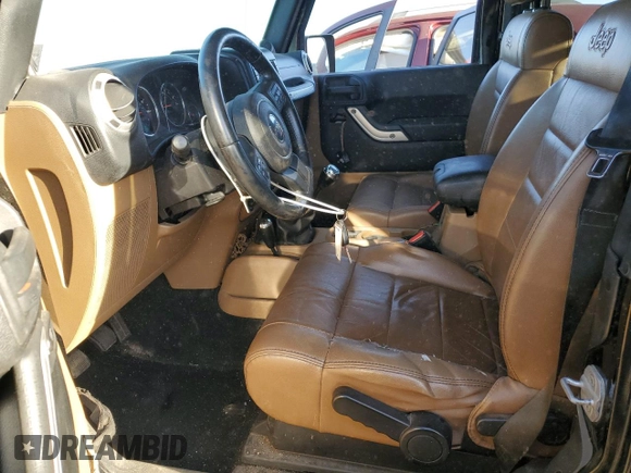 2011 Jeep Wrangler Sahara with VIN 1J4GA5D16BL567739, listed as a Copart auction lot 73542244 with 282,392 mi miles and Non Repairable. Bid and sale history available at DreamBid. Image 7.