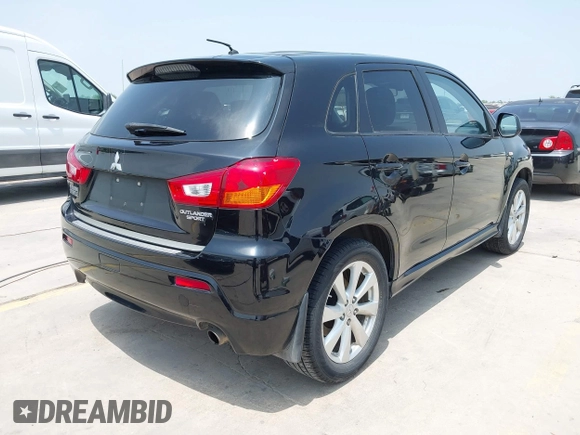 2012 Mitsubishi Outlander SE with VIN JA4AP4AU1CZ002844, listed as a IAAI auction lot 42297590 with 66,065 mi miles and . Bid and sale history available at DreamBid. Image 4.