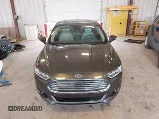 2016 Ford Fusion Titanium with VIN 3FA6P0D9XGR223354, listed as a IAAI auction lot 42621924 with Not provided miles and . Bid and sale history available at DreamBid. Image 12.