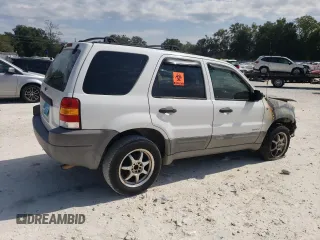 2002 Ford Escape XLS Choice with VIN 1FMYU011X2KB24469, listed as a Copart auction lot 76462504 with Not provided miles and Salvage title. Bid and sale history available at DreamBid. Image 3.