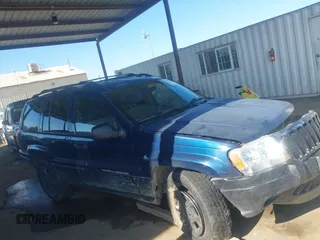 2000 Jeep Grand Cherokee Laredo with VIN 1J4G248SXYC274865, listed as a IAAI auction lot 42542922 with 185,902 mi miles and . Bid and sale history available at DreamBid. Image 13.