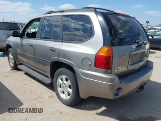 2006 GMC Envoy SLT with VIN 1GKDS13S462185122, listed as a IAAI auction lot 41778816 with 220,974 mi miles. Bid and sale history available at carsss.com. Image 3.