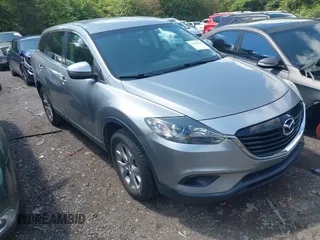 2015 Mazda CX-9 Touring with VIN JM3TB2CA2F0451180, listed as a IAAI auction lot 42180078 with 112,804 mi miles and . Bid and sale history available at carsss.com. Image 1.
