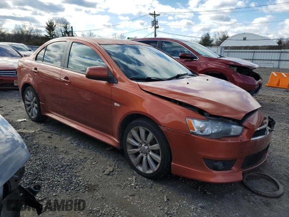 2011 Mitsubishi Lancer GTS with VIN JA32U8FW6BU011215, listed as a Copart auction lot 86357004 with 128,577 mi miles and Salvage Title. Bid and sale history available at carsss.com. Image 4.