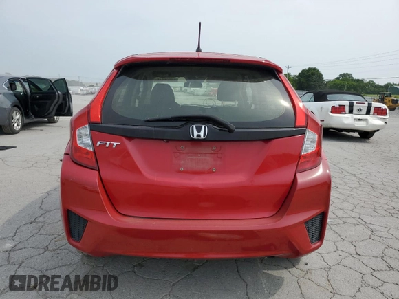2016 Honda Fit LX z VIN JHMGK5H56GX010389, wystawiony jako Copart lot #60806645 z przebiegiem 162 670 mil mil oraz Czysty tytuł • Clean title. Historia ofert i sprzedaży dostępna na DreamBid. Obrazek 6.