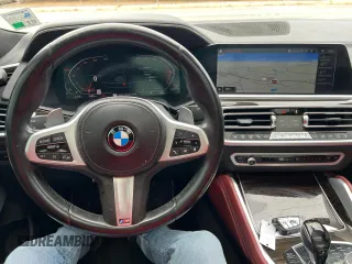 2021 BMW X6 sDrive40i z VIN 5UXCY4C05M9H19479, wystawiony jako Copart lot #54268205 z przebiegiem 85 899 mil mil oraz Czysty tytuł • Clean title. Historia ofert i sprzedaży dostępna na DreamBid. Obrazek 7.
