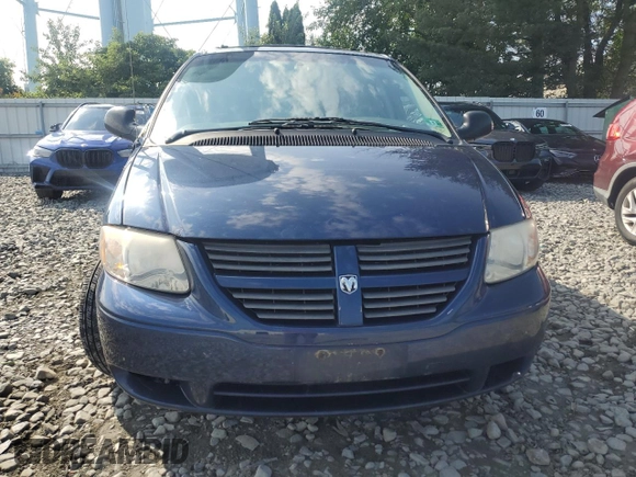 2005 Dodge Caravan SXT with VIN 1D4GP45R75B433581, listed as a Copart auction lot 66086095 with 98,096 mi miles and Salvage title. Bid and sale history available at DreamBid. Image 5.
