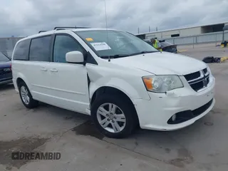 2011 Dodge Grand Caravan Crew with VIN 2D4RN5DGXBR786592, listed as a IAAI auction lot 42114198 with 243,423 mi miles and . Bid and sale history available at DreamBid. Image 1.