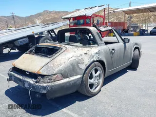 1988 Porsche 911 z VIN WP0EB0917JS161351, wystawiony jako IAAI lot #39908257 z przebiegiem Nie podano mil oraz . Historia ofert i sprzedaży dostępna na DreamBid. Obrazek 4.