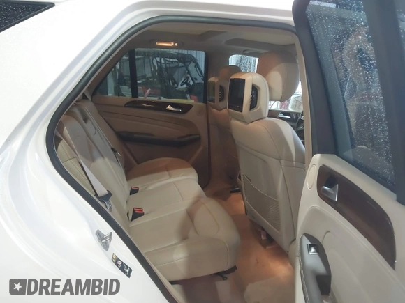2013 Mercedes-Benz M 550 with VIN 4JGDA7DB3DA165765, listed as a IAAI auction lot 42323988 with 96,344 mi miles and . Bid and sale history available at DreamBid. Image 8.