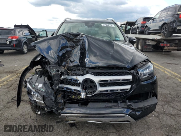2022 Mercedes-Benz GLS 450 with VIN 4JGFF5KE5NA716162, listed as a Copart auction lot 67067154 with 64,142 mi miles and Salvage Title. Bid and sale history available at DreamBid. Image 5.