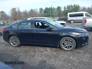 2019 Ford Fusion SEL with VIN 3FA6P0CD8KR265181, listed as a IAAI auction lot 41942425 with 66,228 mi miles and . Bid and sale history available at DreamBid. Image 13.