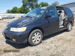 2004 Honda Odyssey EX-L with VIN 5FNRL18934B029944, listed as a Copart auction lot 62482275 with 289,561 mi miles and Salvage title. Bid and sale history available at DreamBid. Image 1.
