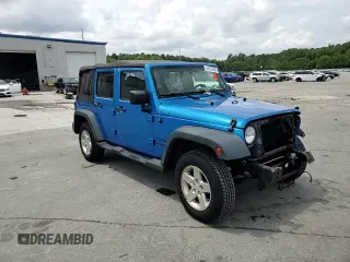 2015 Jeep Wrangler Unlimited Willys Wheeler with VIN 1C4BJWDG4FL611656, listed as a Copart auction lot 54010395 with 129,797 mi miles and Salvage Title. Bid and sale history available at DreamBid. Image 14.